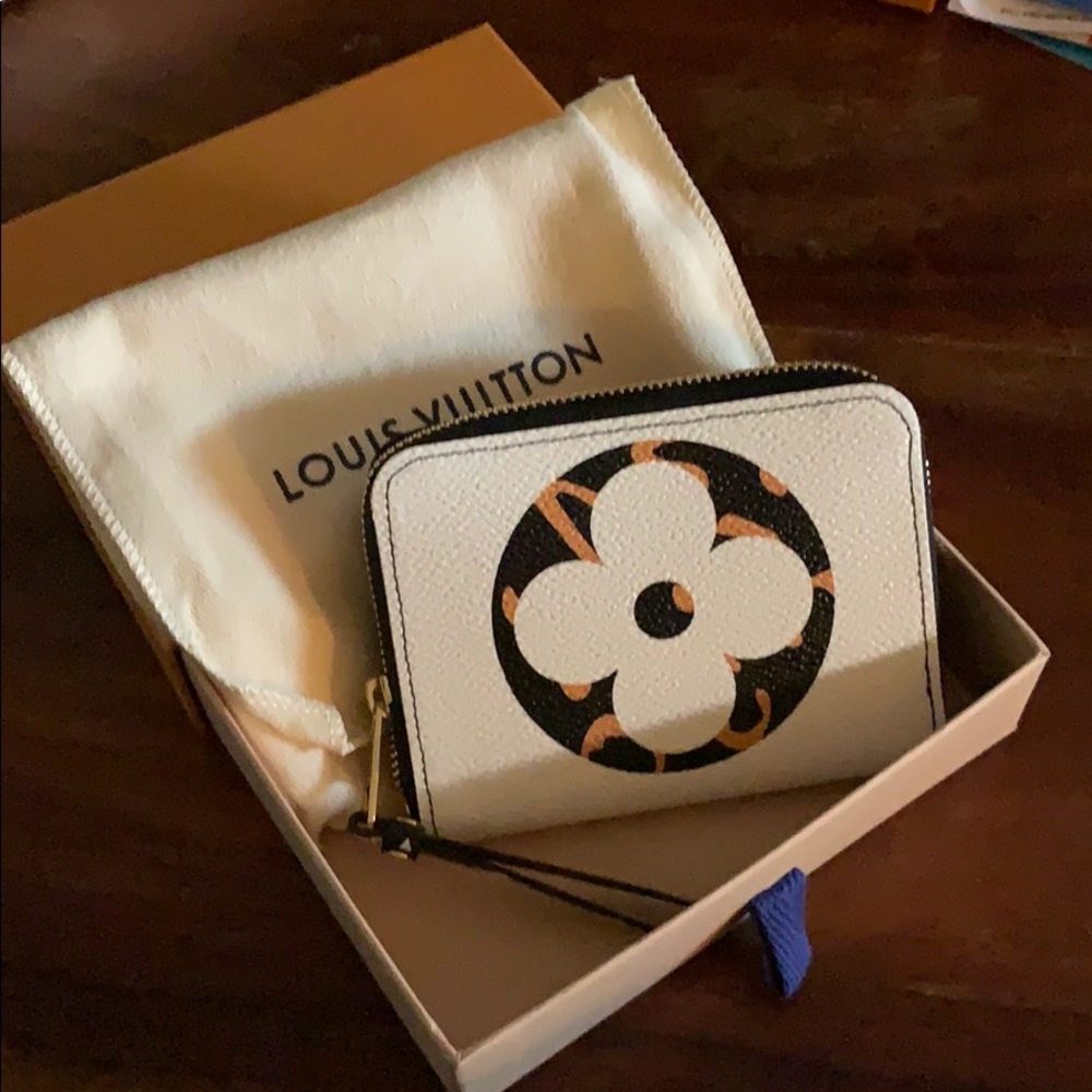 Sold **Louis Vuitton  Jungle collection zippy coin